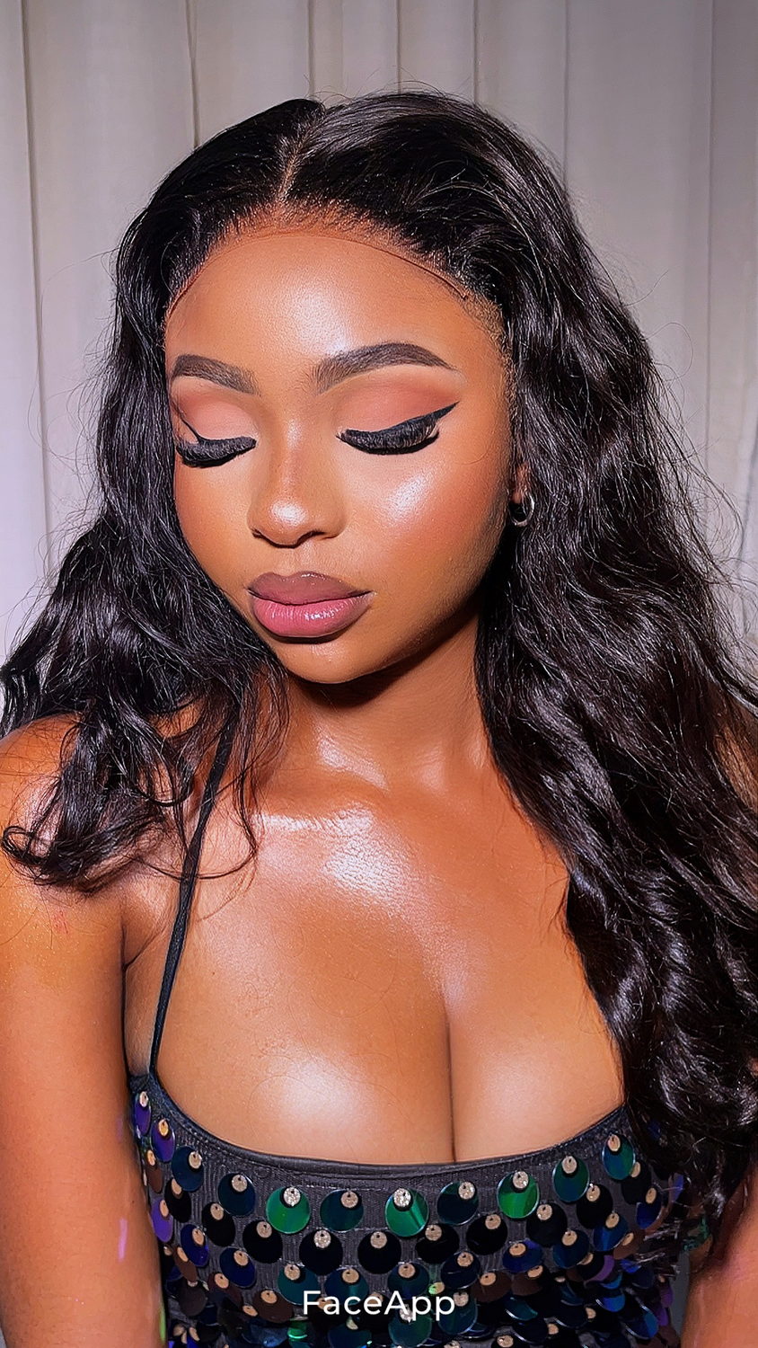 Evening glam with dramatic black winged liner, warm peach shadow, ombre mauve lips and a green-and-blue sequinned top